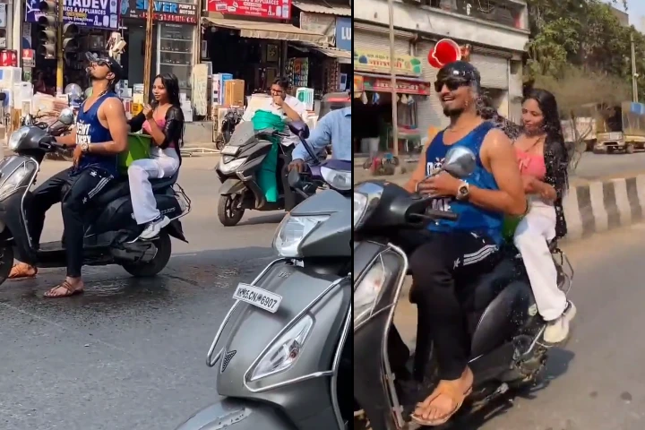 Video: चलती स्कूटी पर नहाने लगी लड़की, वीडियो देखकर भड़क गए लोग, पुलिस ने करी FIR दर्ज