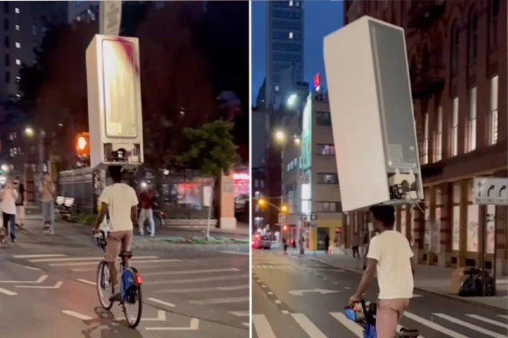 Viral Video: सिर पर फ्रिज उठाकर साइकिल चलाता शख्स का वीडियो हुआ वायरल,देखकर लोग हुए हक्के-बक्के।